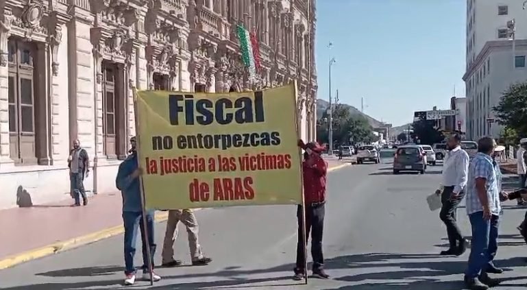Afectados por ARAS se movilizan en el corazón de la capital